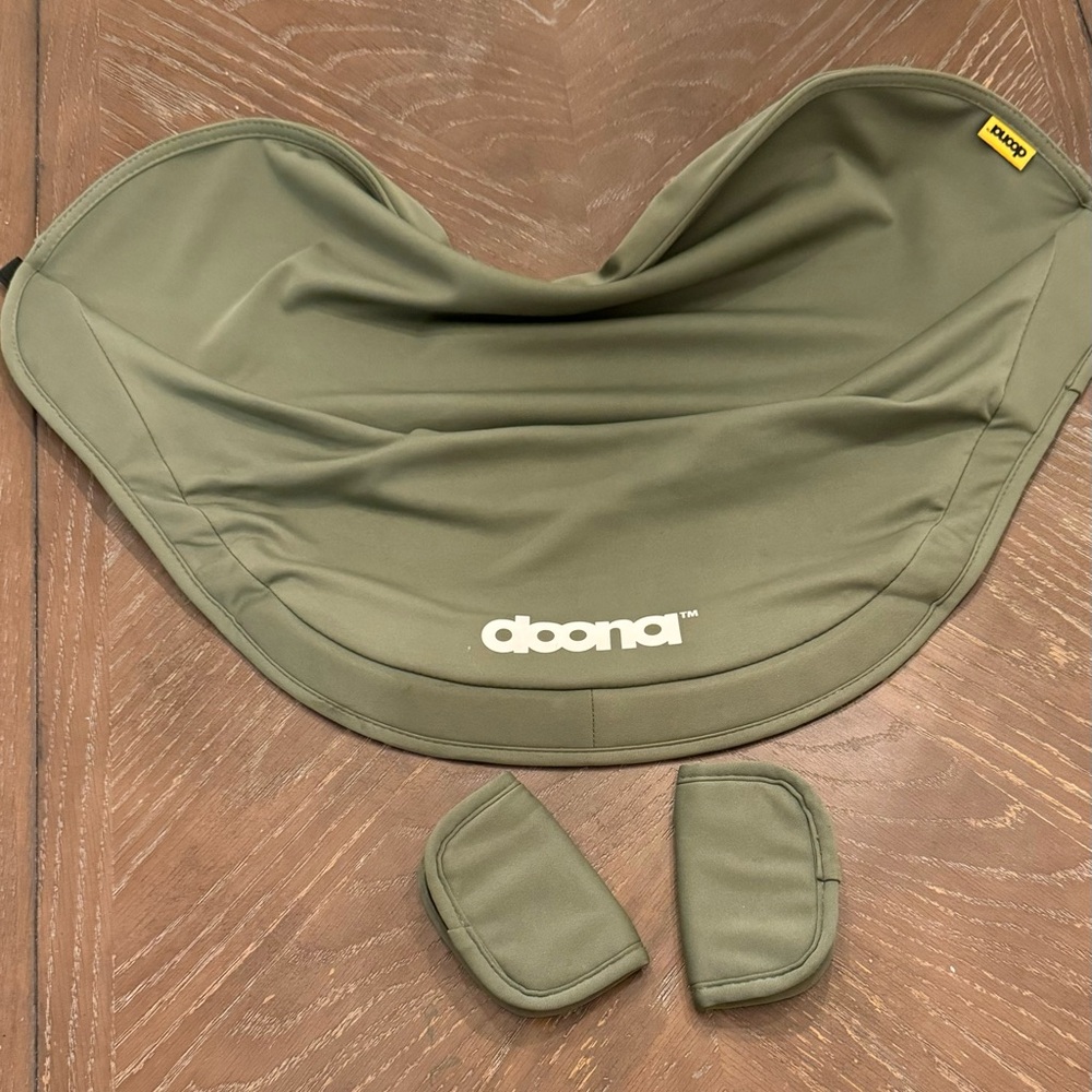 Doona Green canopy cover and strap covers